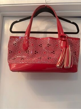 Red Laser-Cut Tote with Tassel Accent